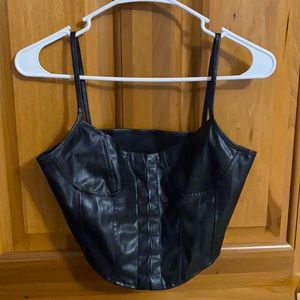 Black leather crop top.